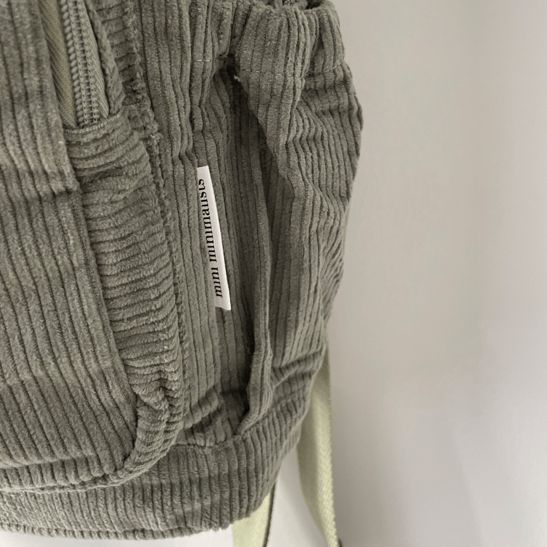 Grey shop corduroy backpack